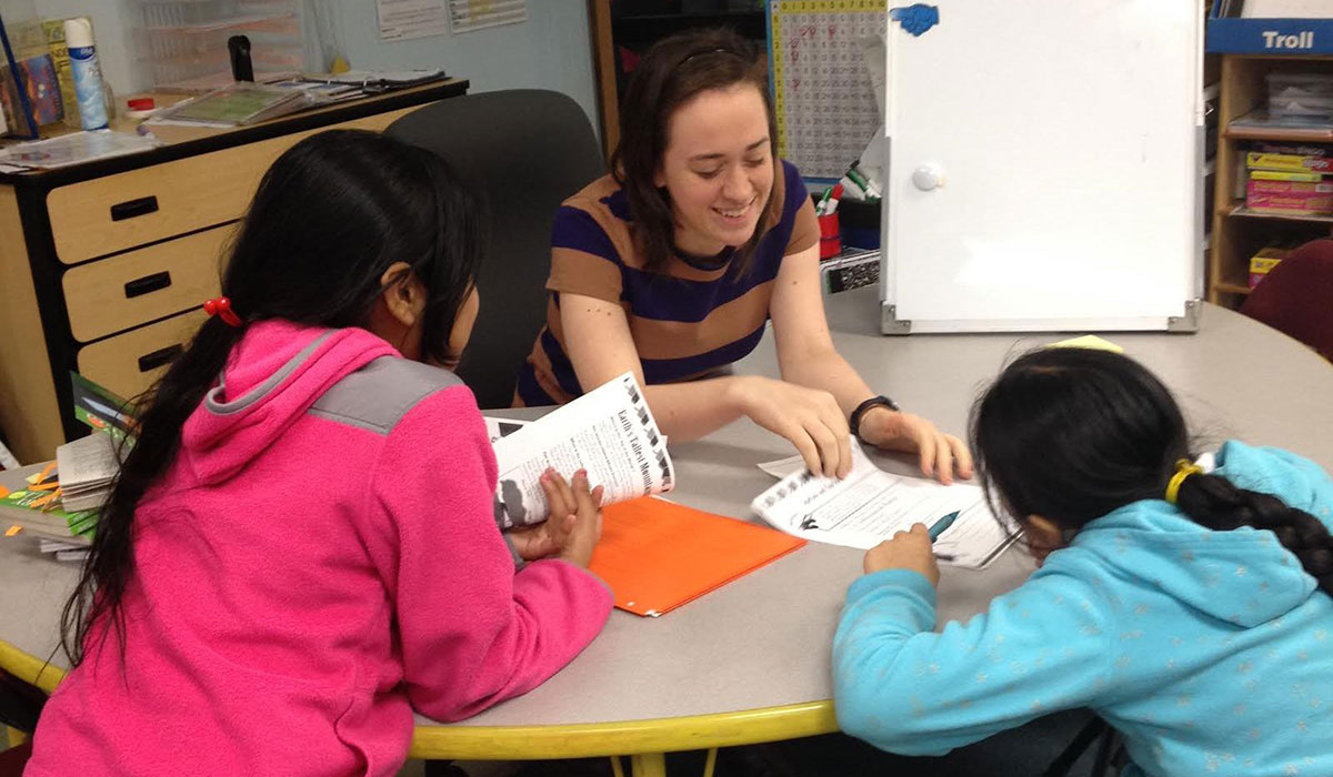 Teacher with students