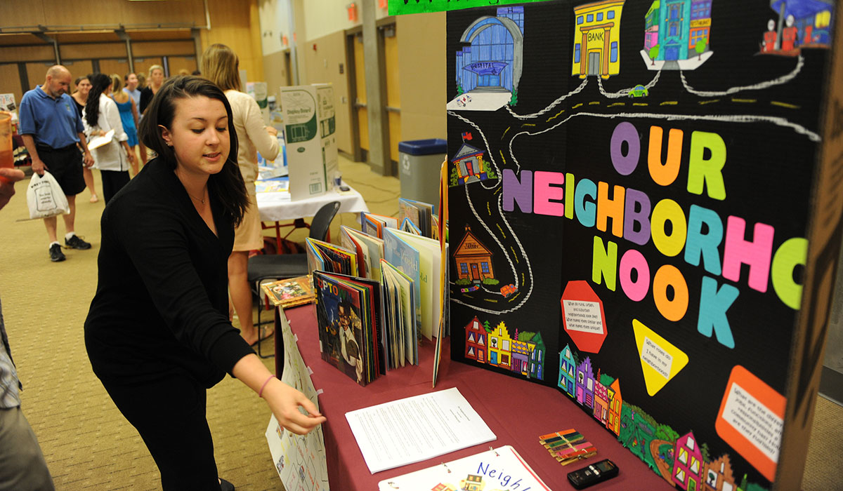 Student presenting poster